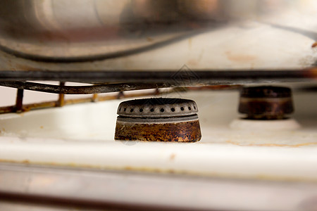 煤气炊具上的旧烧炉厨具火炉金属青铜煤油古董厨房历史腐蚀汽油图片
