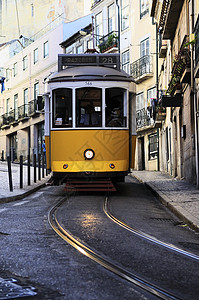 里斯本Tram黄色场景街道有轨电车运输城市生活乡愁城市市中心旅行图片