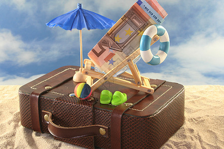 带薪休假闲暇娱乐海滩太阳太阳椅旅行水球木椅休息谎言图片
