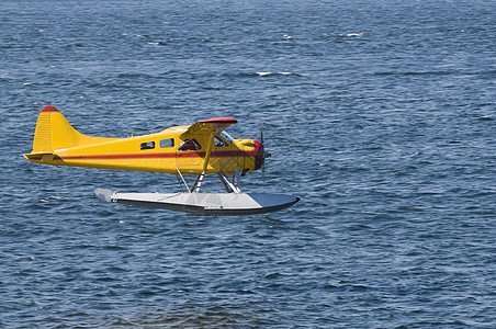 登陆的海上飞机运输港口翅膀海浪水上飞机座舱飞行海岸螺旋桨浮桥图片