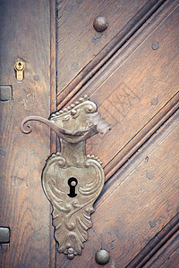 旧门把手风格木头装饰历史裂缝建筑学螺栓入口金属艺术图片
