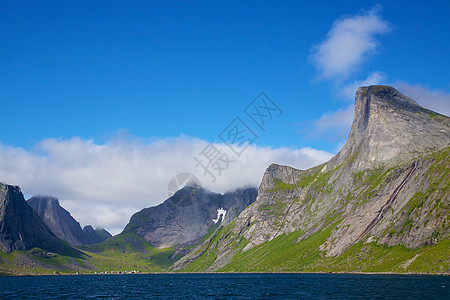 景色峡湾全景海岸线风景悬崖晴天海洋山峰海岸山脉蓝色图片