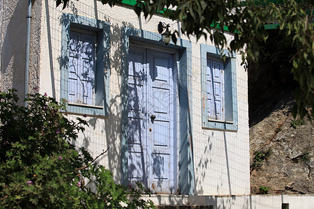 希腊多德卡尼萨科斯岛Zia村房子住宅入口植物文化木头蓝色假期美丽街道图片