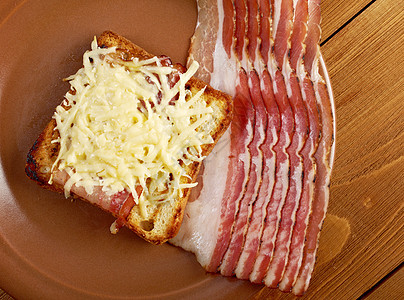 芝士烤面包加一块培根英语美味白色食物宏观水平盘子图片