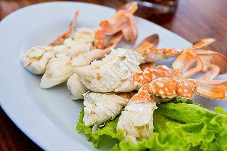 螃蟹腿片国王餐具午餐泡沫课程动物用餐桌子海鲜玻璃图片