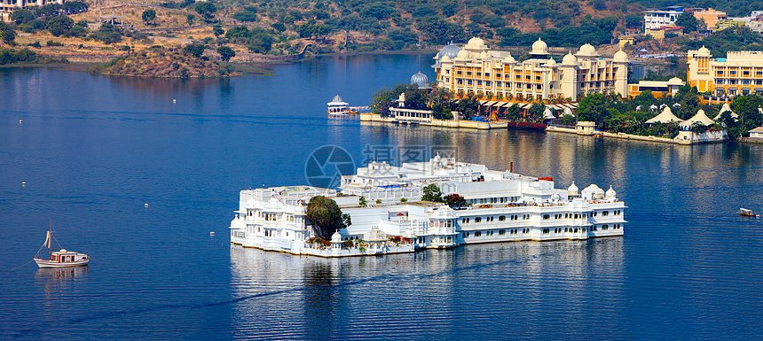 印度乌代普尔Pichola湖和Taj湖宫建筑物摄影大厦历史奢华旅游旅行地标建筑学场景图片