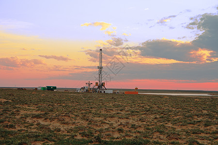 太阳下山草原乐器橙子燃料钻头钻机气体工具地平线场地背景图片