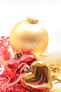 红金的圣诞装饰品玻璃红色季节性卡片丝带星星金子金光庆典图片