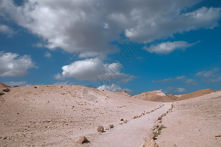 荒漠道路景观沙漠蓝色荒野峡谷天空旅游天气风景地平线石头图片