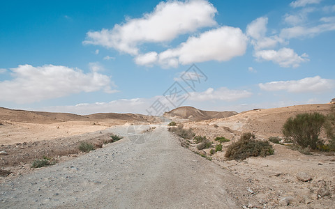荒漠道路景观地平线天空石头蓝色天气旅行沙漠峡谷荒野旅游图片