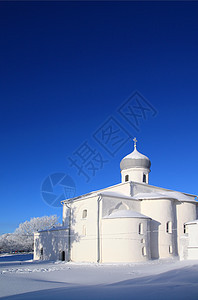 基督教正教教会下雪季节树木气象冰柱水晶仙境天际城市阳光图片