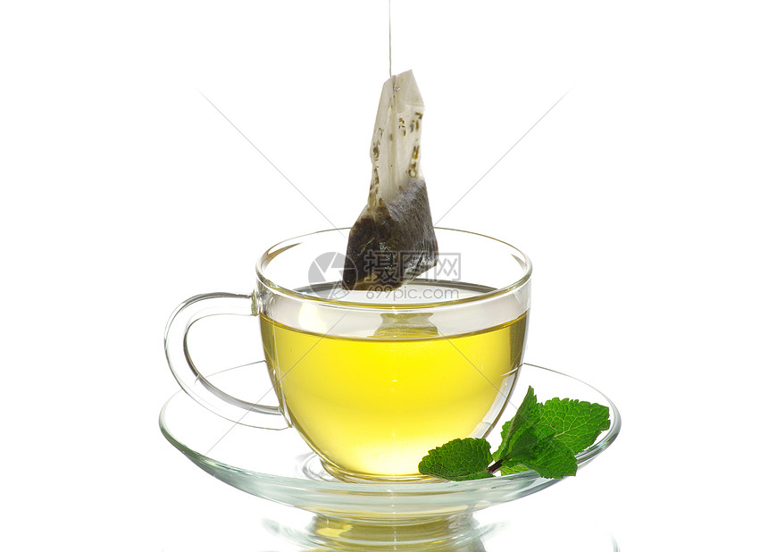 茶杯中的茶薄荷餐具香味草本植物杯子水果盘子橙子柠檬白色图片
