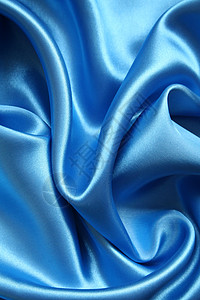 平滑优雅的蓝色丝绸银色海浪材料布料折痕曲线纺织品投标织物图片