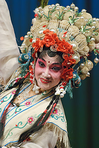 化妆品摄影穿传统服装的漂亮的中国歌剧女演员舞蹈想像力娱乐展示节日戏服剧院文化女士化妆品背景