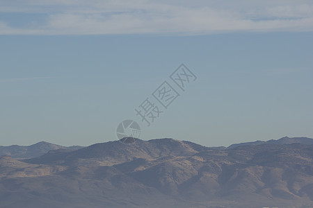 带天空的山地山脉日落场景目的地阳光沙漠太阳风景天际剪影旅游图片