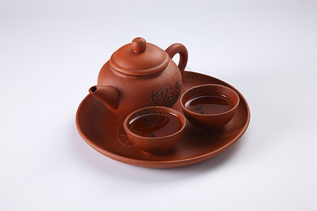 东方茶壶陶瓷工艺阴影文化制品食物传统陶器艺术棕色图片