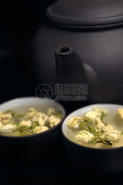 中国茉菊茶壶和杯子茉莉茉莉花叶子输液草本植物植物花瓣图片