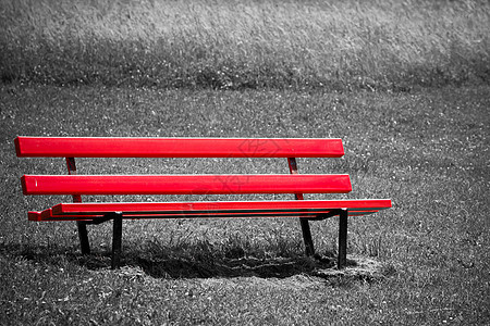 公园中的空红色长椅图片