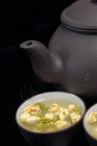 中国茉菊茶壶和杯子叶子花瓣植物草本植物茉莉茉莉花输液图片