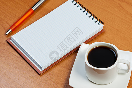 桌子和咖啡笔记本图片
