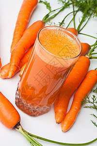 胡萝卜和胡萝卜汁补品树叶饮食食品玻璃营养营养素农业福利食物图片