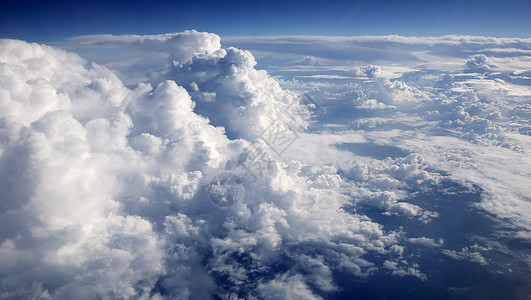 从航空飞机上看到蓝色空中云层阳光天气气候太阳环境晴天天空云景天堂水分图片