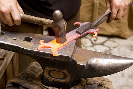 铁匠锻造铁匠铁砧锤子工人工作古董乐器职业辉光工艺金属精神贸易图片