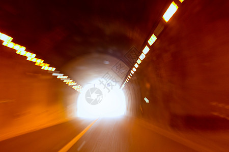 模糊的动作隧道 像驾驶醉酒隐喻踪迹城市曲线运动车辆运输过境街道线条橙子背景图片
