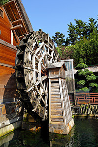 木制水轮水车旅游房子历史性建筑石头历史花园城市文化图片