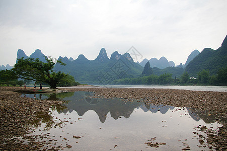 中国美丽的喀斯特山地景观漂浮支撑农村水路爬坡场景岩溶假期天空竹子图片