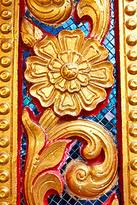 在庙墙上的金色泰国图案设计建筑学风格古董金子工艺装饰文化墙纸装饰品寺庙图片