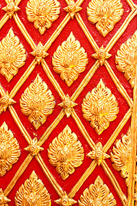 在庙墙上的金色泰国图案设计墙纸金子工艺文化装饰古董宗教寺庙建筑装饰品图片