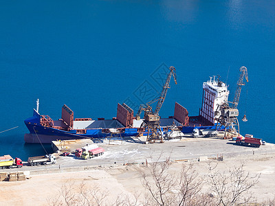货货船修理高架龙门架船体血管港口橙子货物码头海洋图片