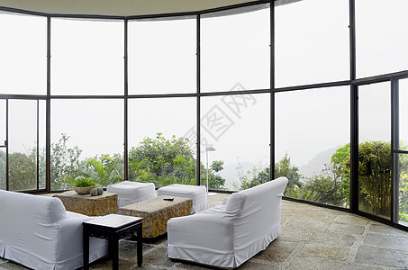 客厅中心茶几旅游胜地家具沙发白色玻璃窗桌子椅子背景图片