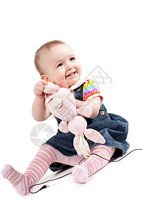 小可爱的小女孩兔子孩子女孩女性乐趣童年微笑婴儿幸福白色图片
