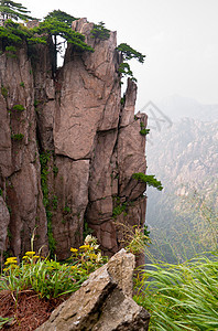 黄山峰山脉顶峰荒野勘探悬崖旅行风景远足旅游公园图片