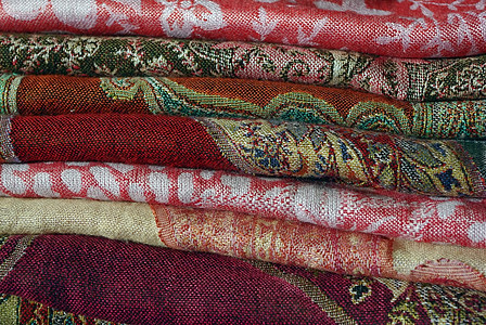折叠彩色制造器和肖盘的皮质销售棉布亚麻快乐材料围巾纺织品薄纱零售毯子图片