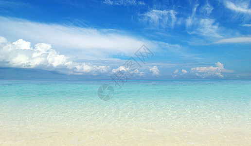 沙滩和热带海海洋太阳海浪天空放松天堂晴天蓝色海岸支撑图片