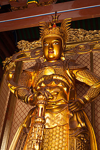 雕像金子佛教徒房顶雕塑监护人寺院菩萨宗教寺庙瓦片图片