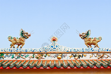 中国风格的龙雕像文化刺刀节日天空蓝色装饰品艺术动物信仰寺庙图片