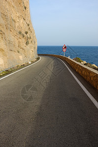 风景道路曲线海岸警告弯曲悬崖沥青岩石图片