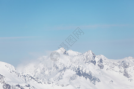 平面顶部爬坡运动全景冻结岩石天空蓝色暴风雪旅行高山图片