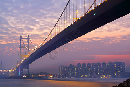 日落时桥桥 山桥街道天空小时海洋蓝色交通景观运动速度旅行图片