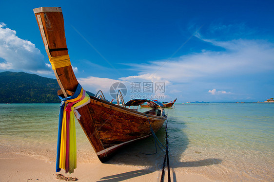 海上渔船海岸天堂蓝色旅行天空娱乐岩石珊瑚支撑尾巴图片