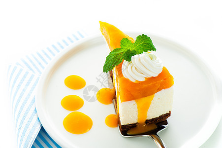 一个芒果奶酪蛋糕 白色背景的芒果芝士蛋糕 作为工作室sho开心果糕点馅饼奶油果汁盘子黄油橙子柠檬水果图片