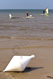 冲浪浮标乐趣沿岸趣味风筝运动航行运动员海岸海滩背景图片
