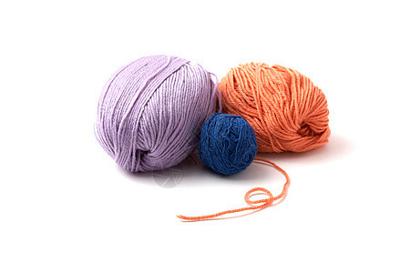 多色线条的球珠工艺绳索橙子针线活手工业缠绕棉布羊毛钩针针织图片