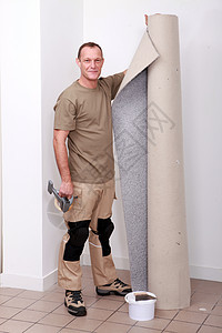 地毯装配器配件男人装饰柔软度材料收藏风格房子地面工人地板高清图片素材