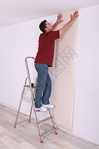 人造墙纸刷子工作男人工艺楼梯金属衬衫活动商业工人图片
