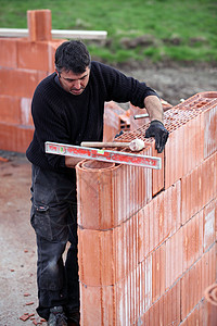 Bricklayer 盖一栋房子石匠职业建造修理建设者工作服瓦工水泥住房工人图片